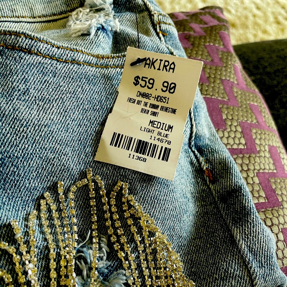 Fringed light blue denim